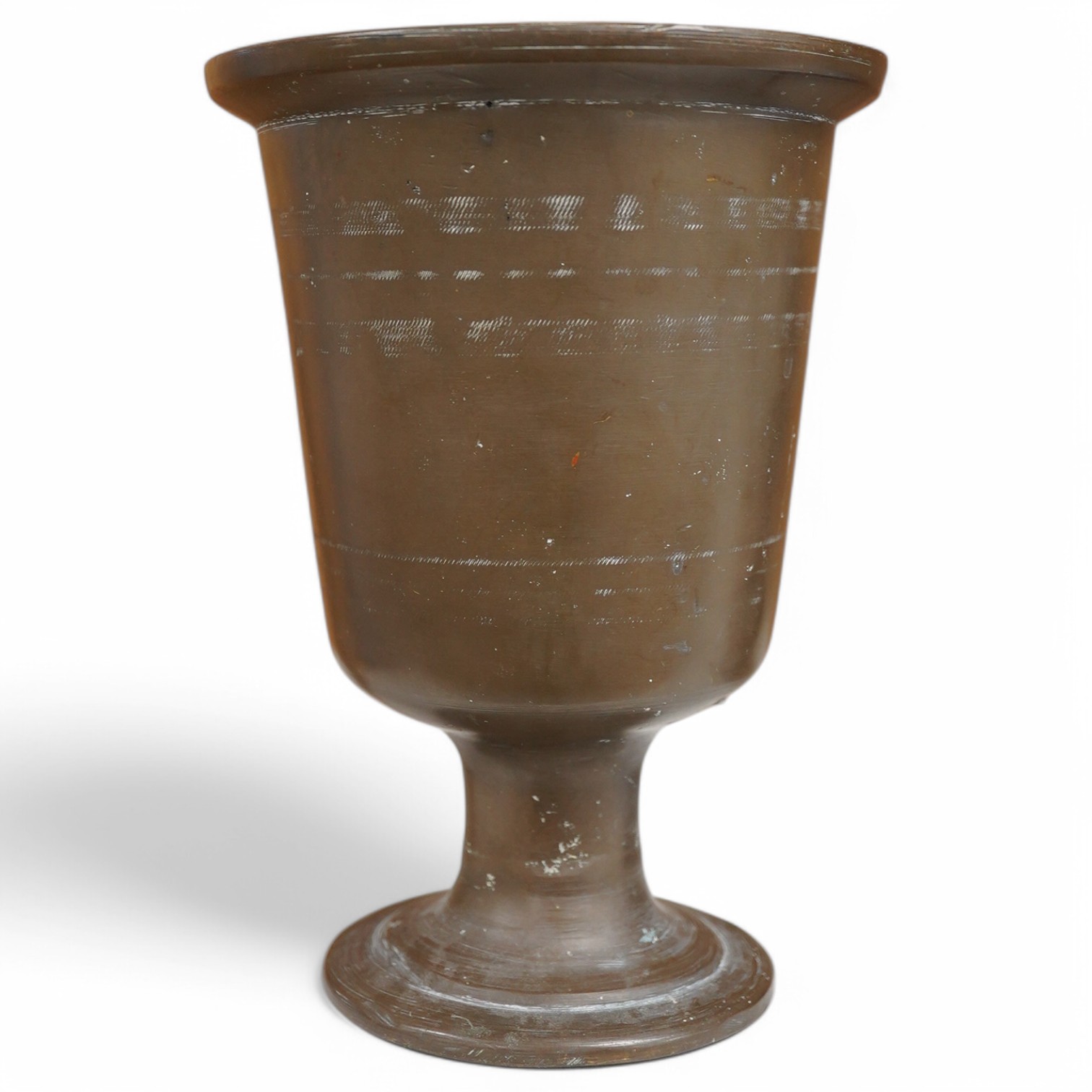 An Indian bronze pedestal mortar 21cm high. Condition - two holes drilled near pedestal.